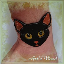 Large bracelet chat noir aux yeux d'ambre